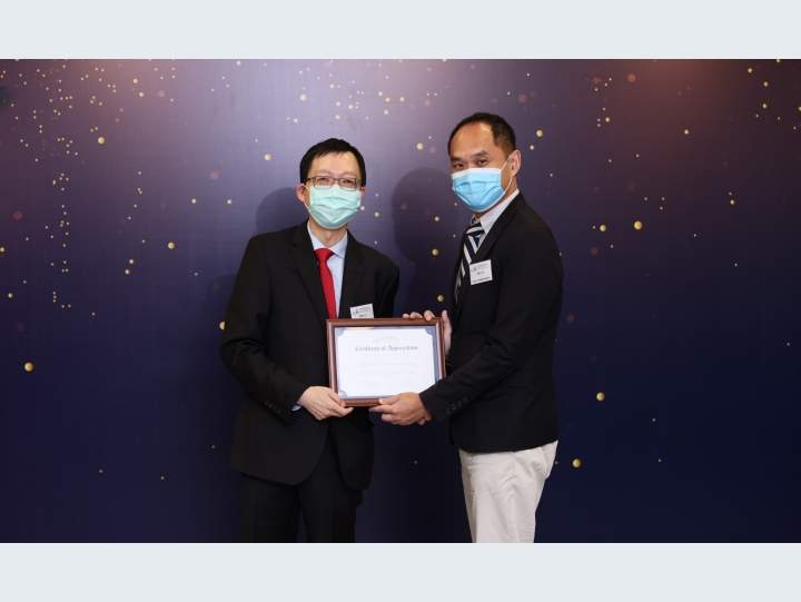 Presenting the Certificate of Appreciation