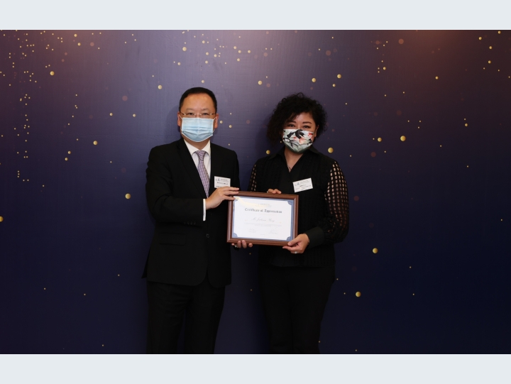 Presenting the Certificate of Appreciation